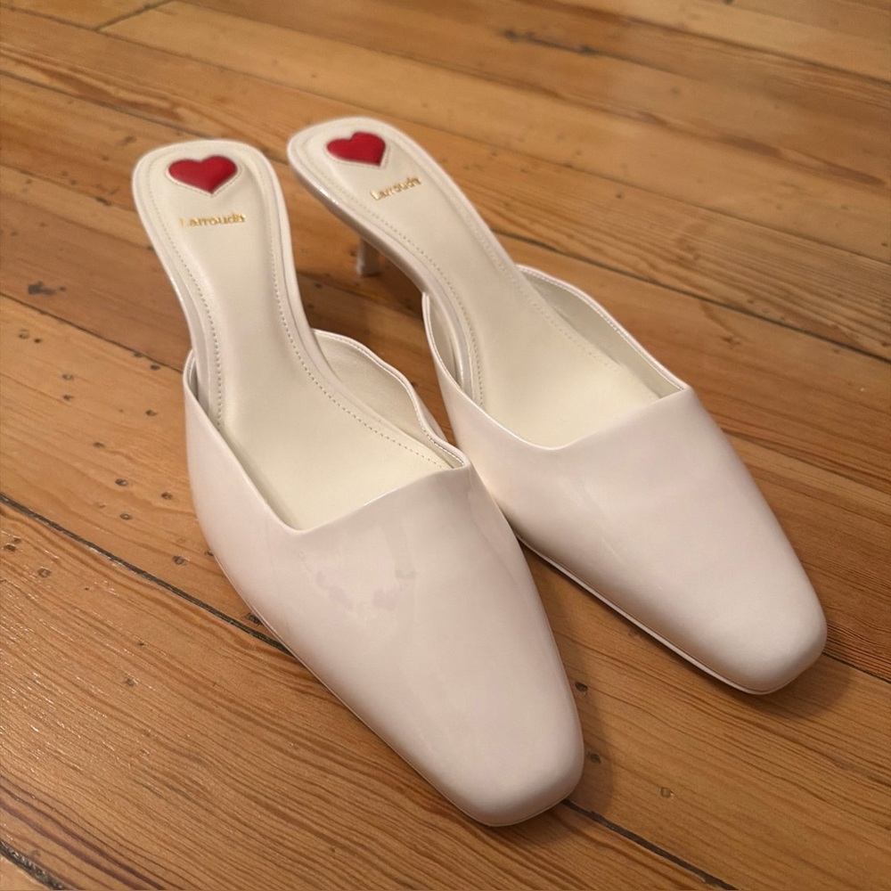 Larroude White Patent Kitten Heel Mules with Red Heart Insole Detail